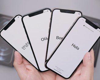 person holding white samsung galaxy note 8