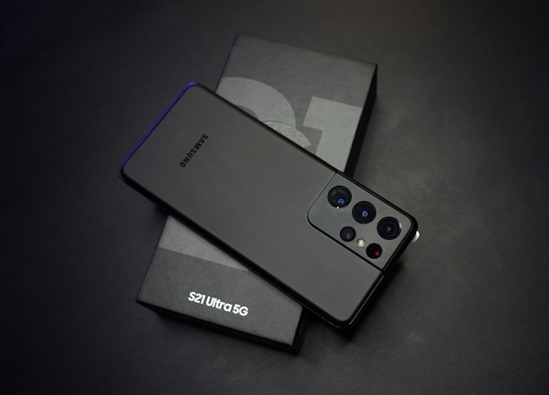 black sony remote control beside white tissue paper